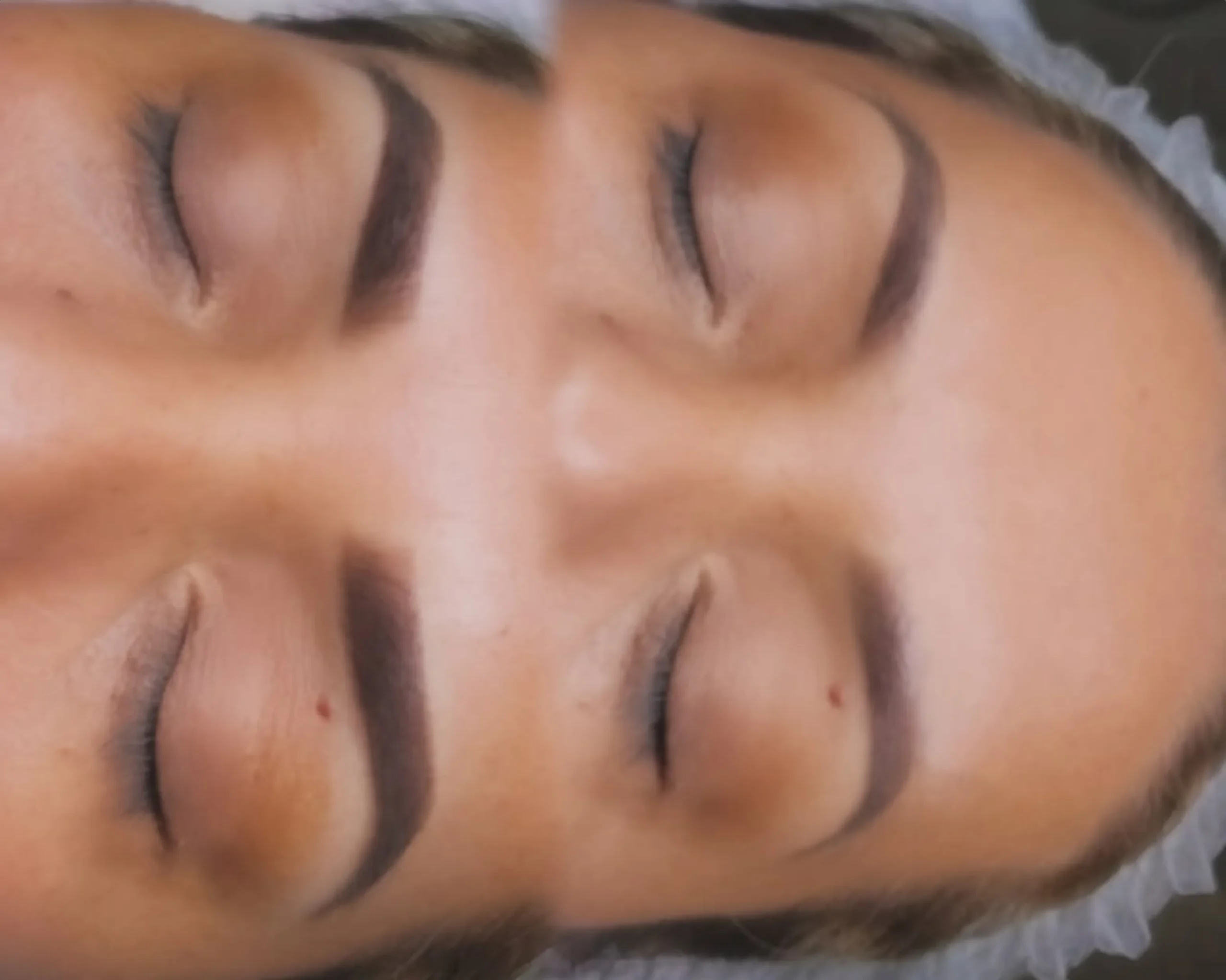 eyebrow feathering tattoo